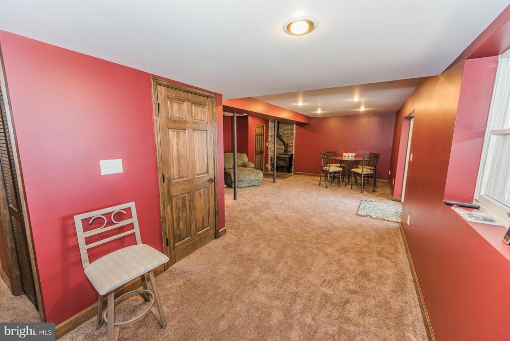 3 Blue Sky Road Linden, VA 22642 - Photo 22 of 30 a view of a livingroom with furniture and chair