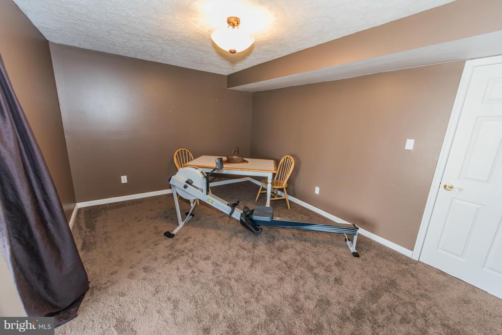 3 Blue Sky Road Linden, VA 22642 - Photo 27 of 30 a view of a room with table and chair