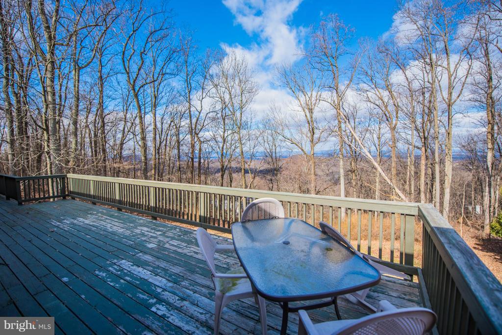3 Blue Sky Road Linden, VA 22642 - Photo 30 of 30 a view of balcony with wooden floor and outdoor seating