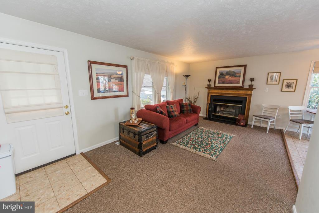 3 Blue Sky Road Linden, VA 22642 - Photo 9 of 30 a living room with furniture a rug and a window