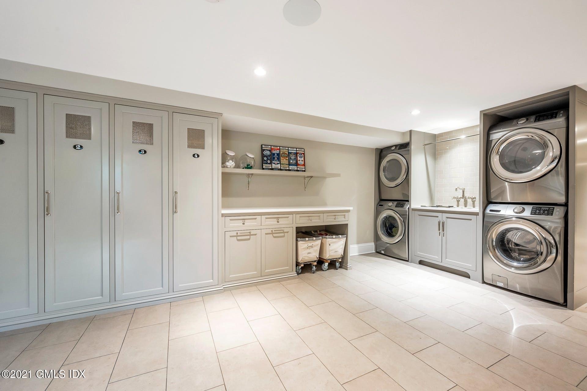 425 Stanwich Road Greenwich, CT 06830 - Photo 28 of 36 a view of a livingroom with washer and dryer