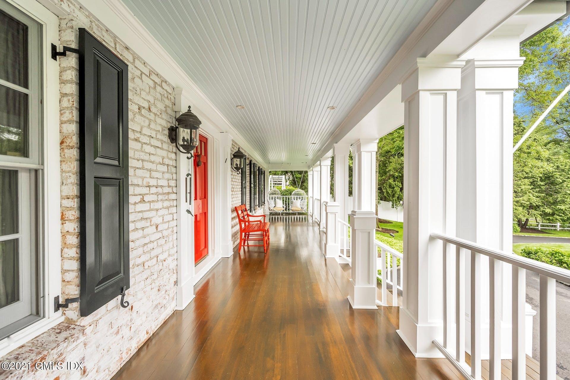 425 Stanwich Road Greenwich, CT 06830 - Photo 29 of 36 a view of a balcony with wooden floor