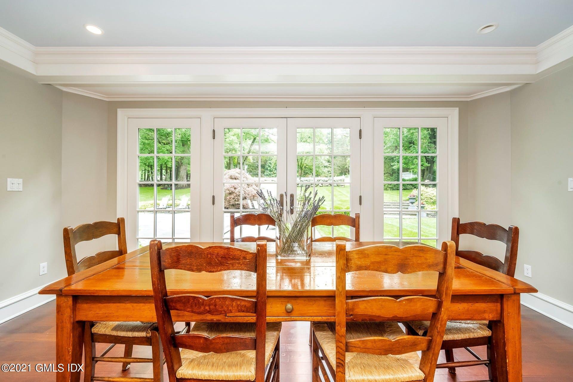 425 Stanwich Road Greenwich, CT 06830 - Photo 8 of 36 a dining room with furniture and windows