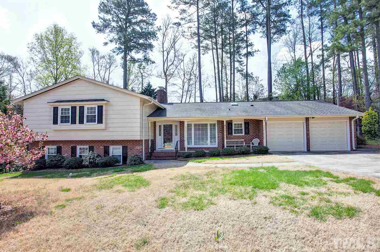 730 Hardimont Road Raleigh, NC 27609 - Photo 1 of 19 front view of a house with a yard