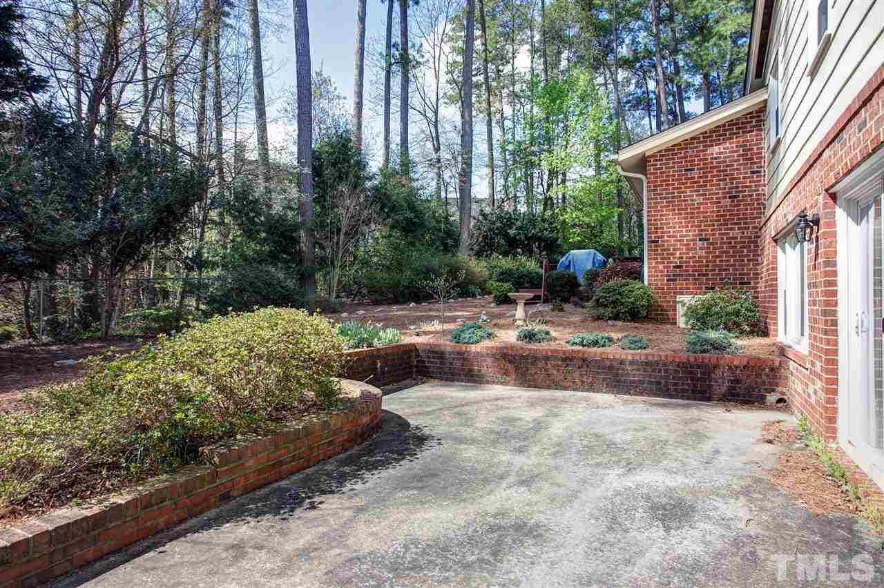 730 Hardimont Road Raleigh, NC 27609 - Photo 17 of 19 a view of a backyard with sitting area