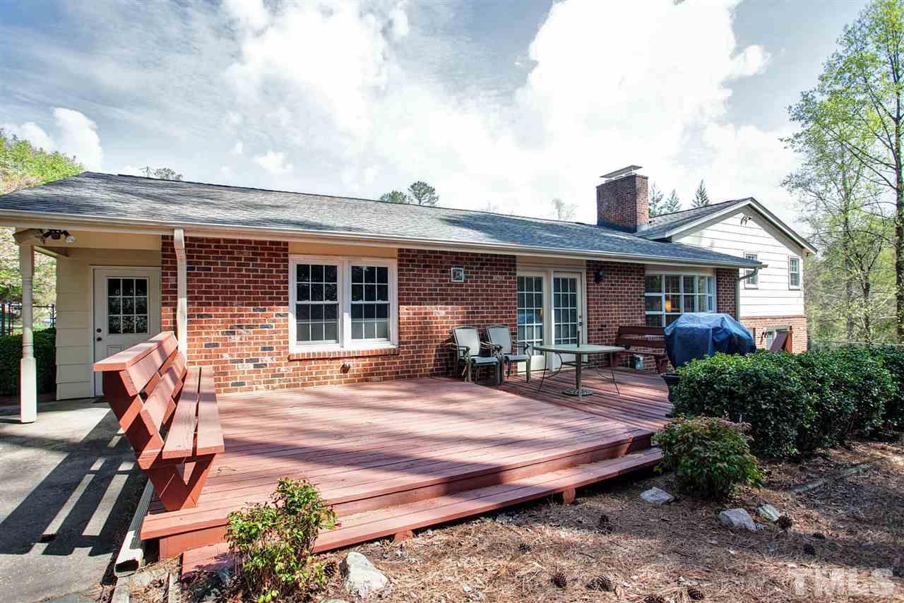 730 Hardimont Road Raleigh, NC 27609 - Photo 18 of 19 a front view of house with outdoor seating