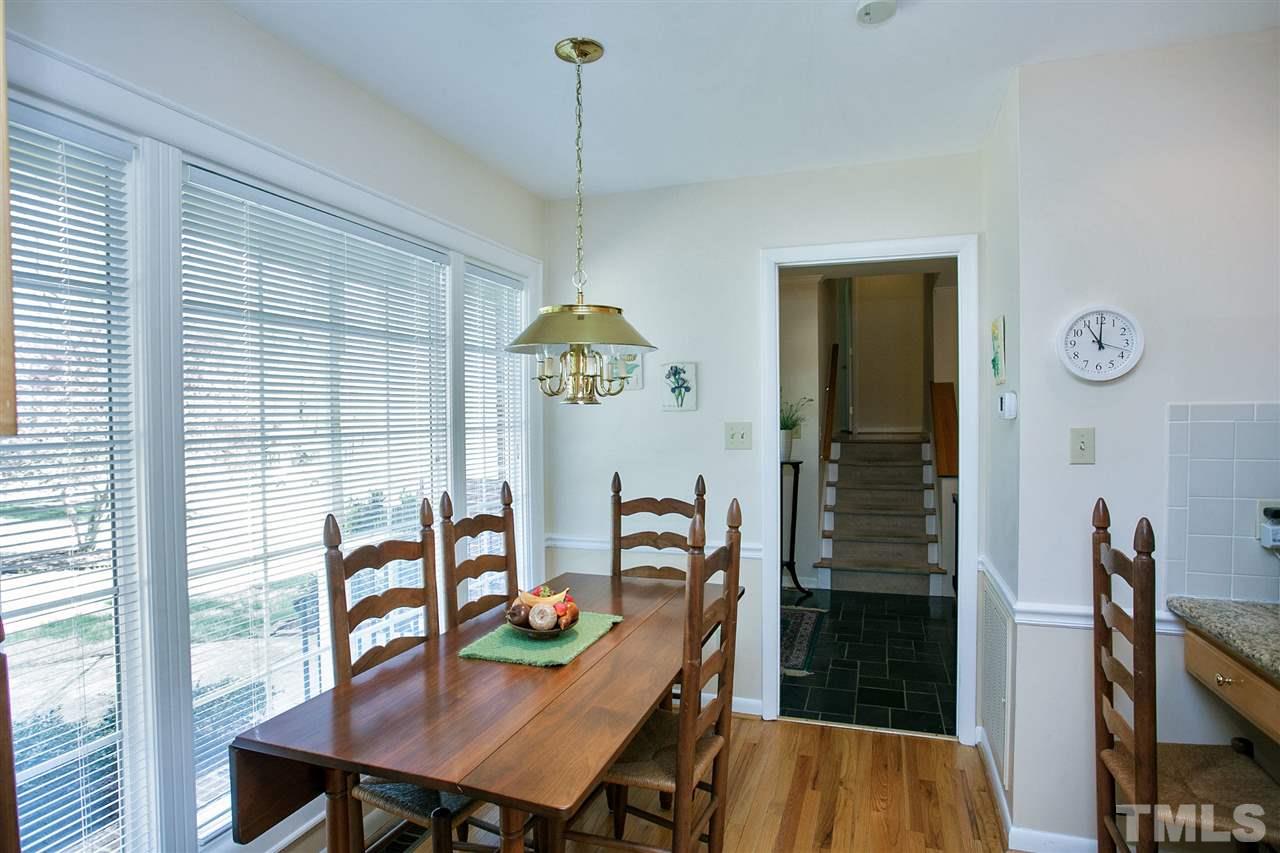 730 Hardimont Road Raleigh, NC 27609 - Photo 8 of 19 a view of a dining room with furniture and a window