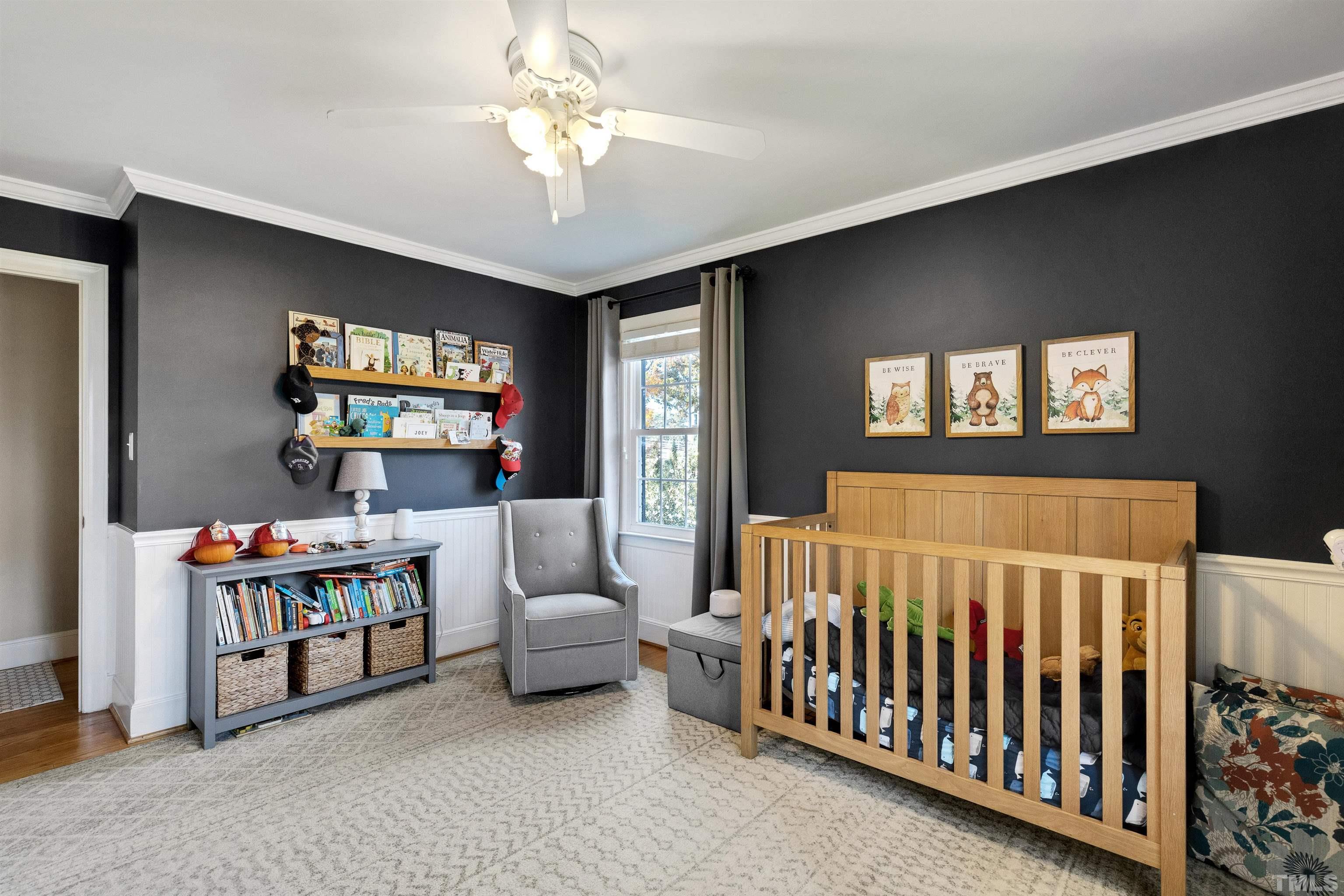 6813 Foxfire Place Raleigh, NC 27615 - Photo 21 of 34 a bedroom with furniture and a window