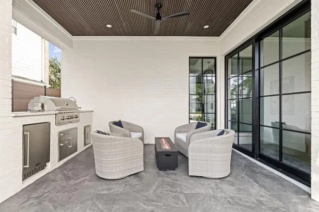 a living room with furniture and window