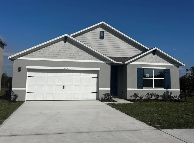 a front view of house with yard