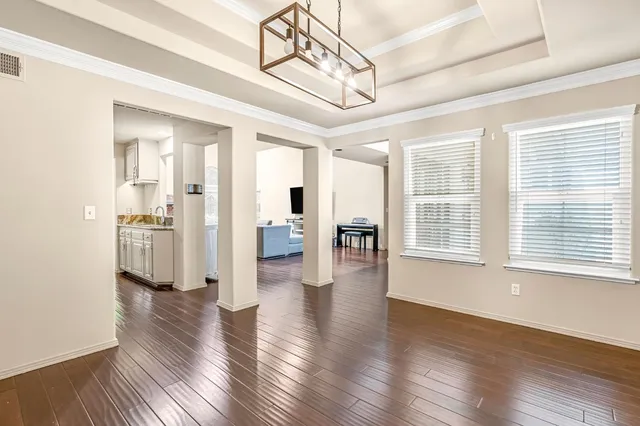 a view of a livingroom with wooden floor