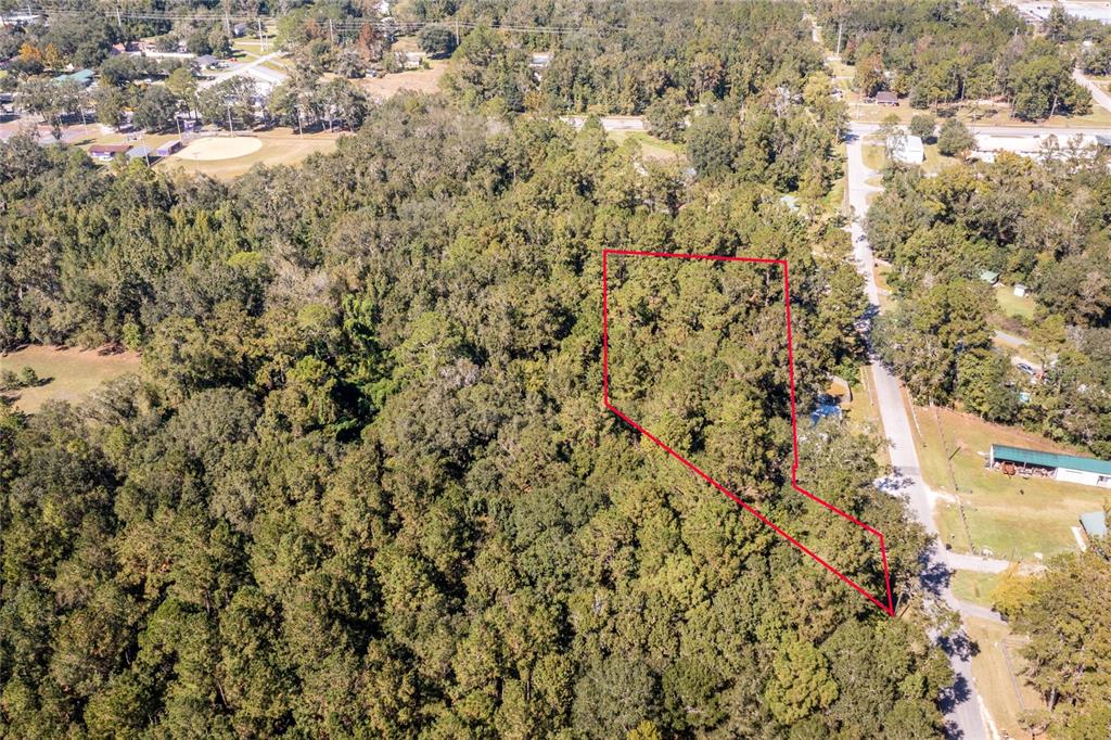 Tbd Southeast 5th Avenue Lake Butler, FL 32054 - Photo 25 of 26 a view of a yard of a building