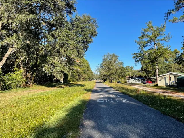 a view of yard with seating space