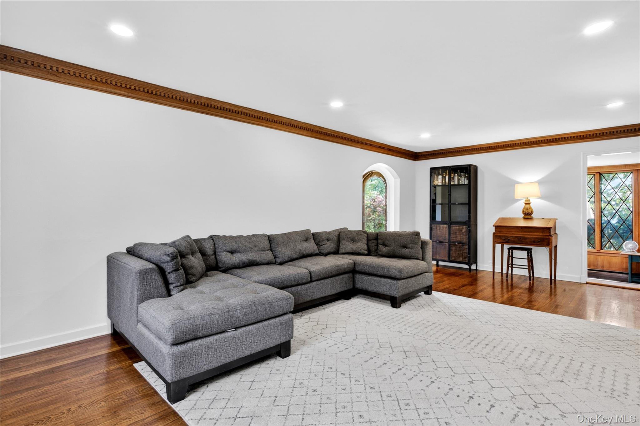 142 Mill Spring Road Manhasset, NY 11030 - Photo 5 of 23 a living room with furniture and a flat screen tv
