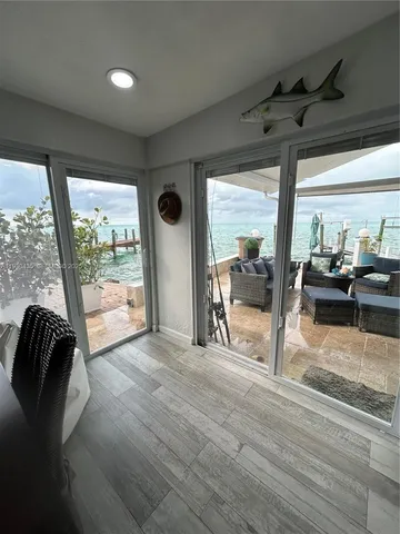 a view of a living room and hardwood floor