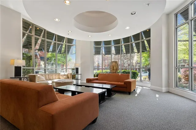 a view of a dining room with furniture window and outside view