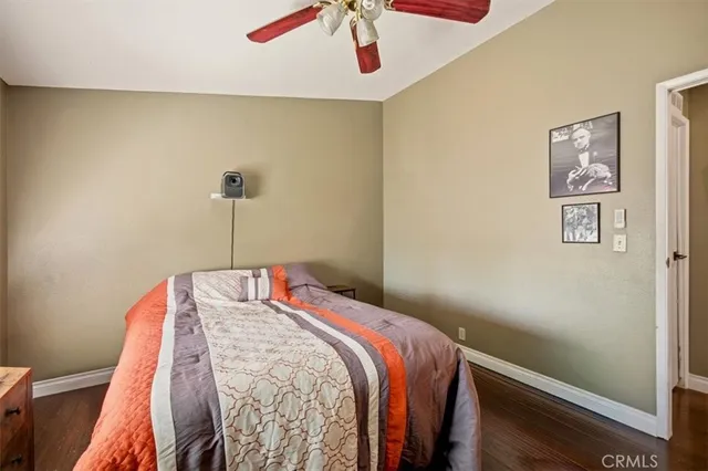 a view of a patio with table and chairs and potted plants