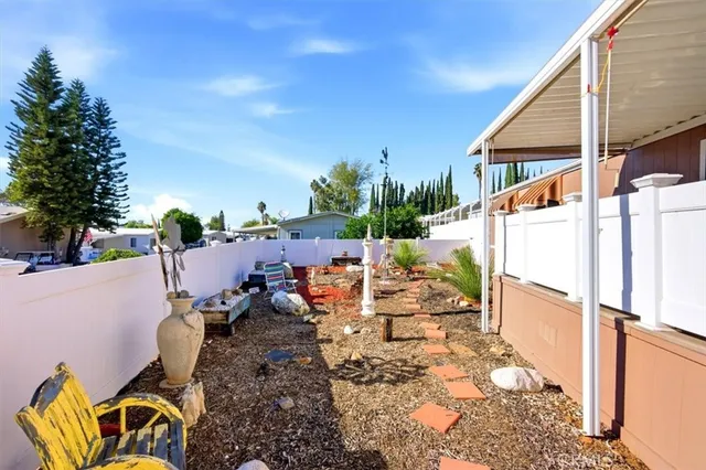 a view of a back yard of the house