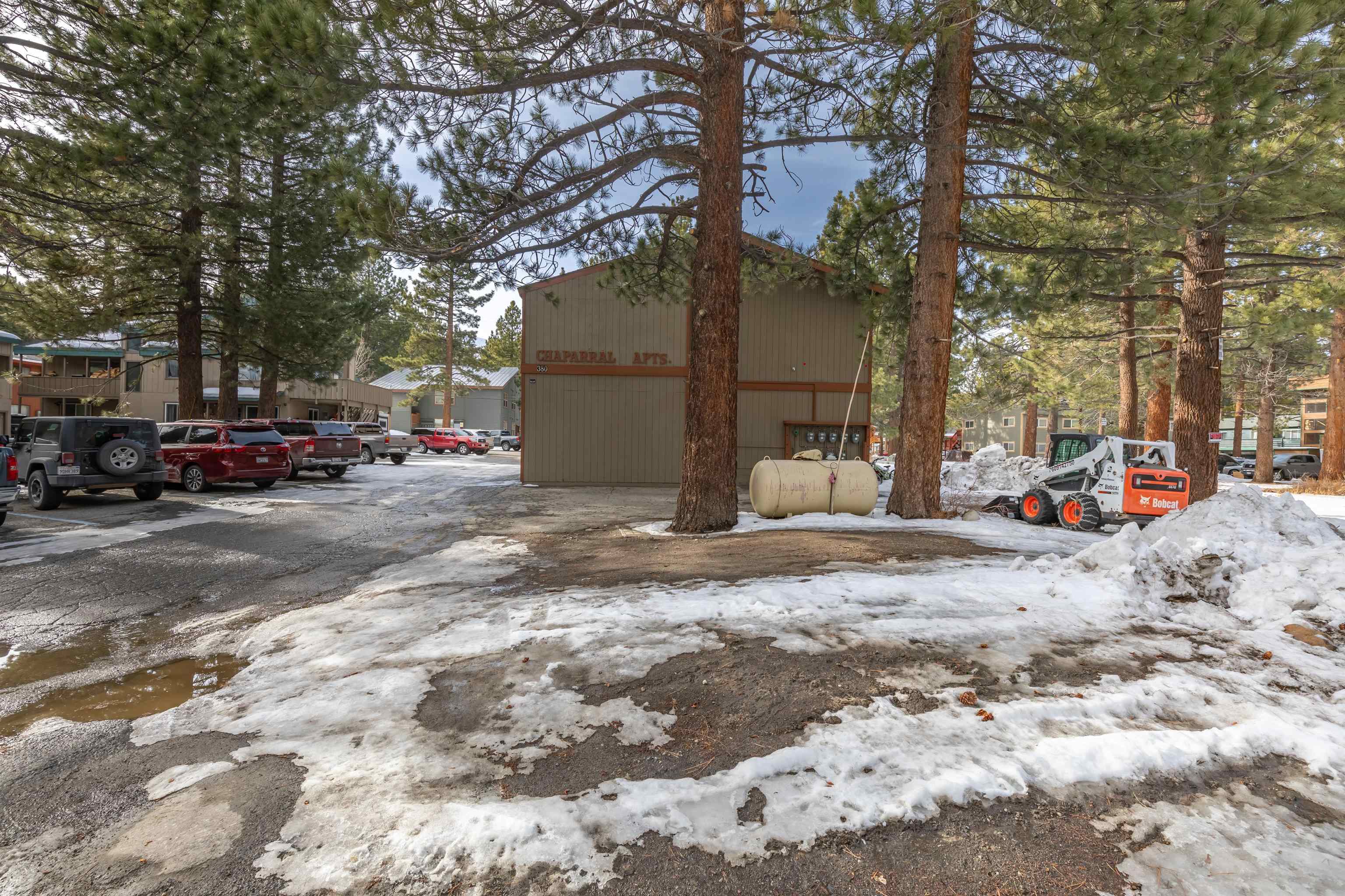 380 Chaparral Road Mammoth Lakes, CA 93546 - Photo 2 of 11 a view of road with parked cars