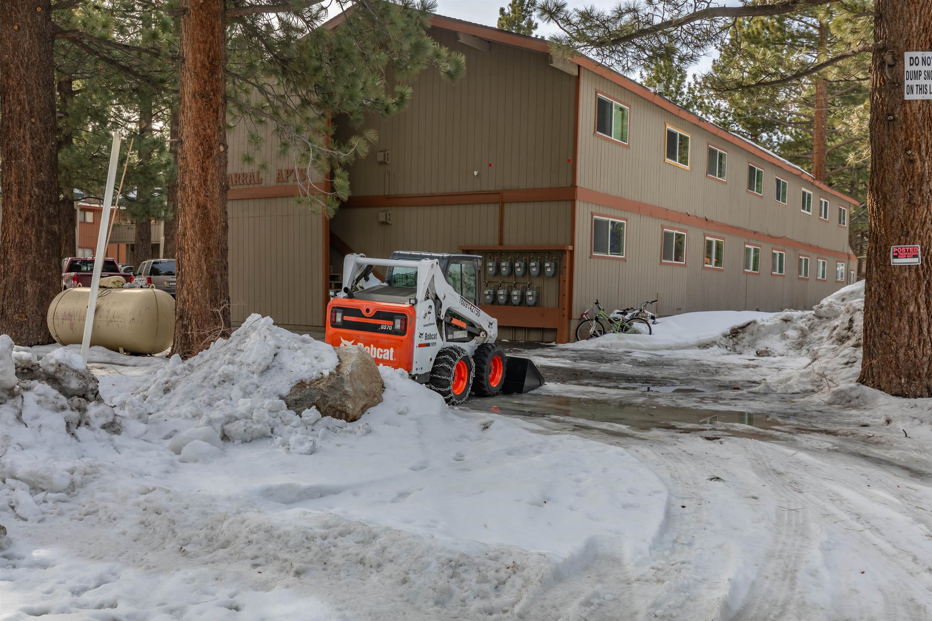 380 Chaparral Road Mammoth Lakes, CA 93546 - Photo 4 of 11 a car parked in front of house