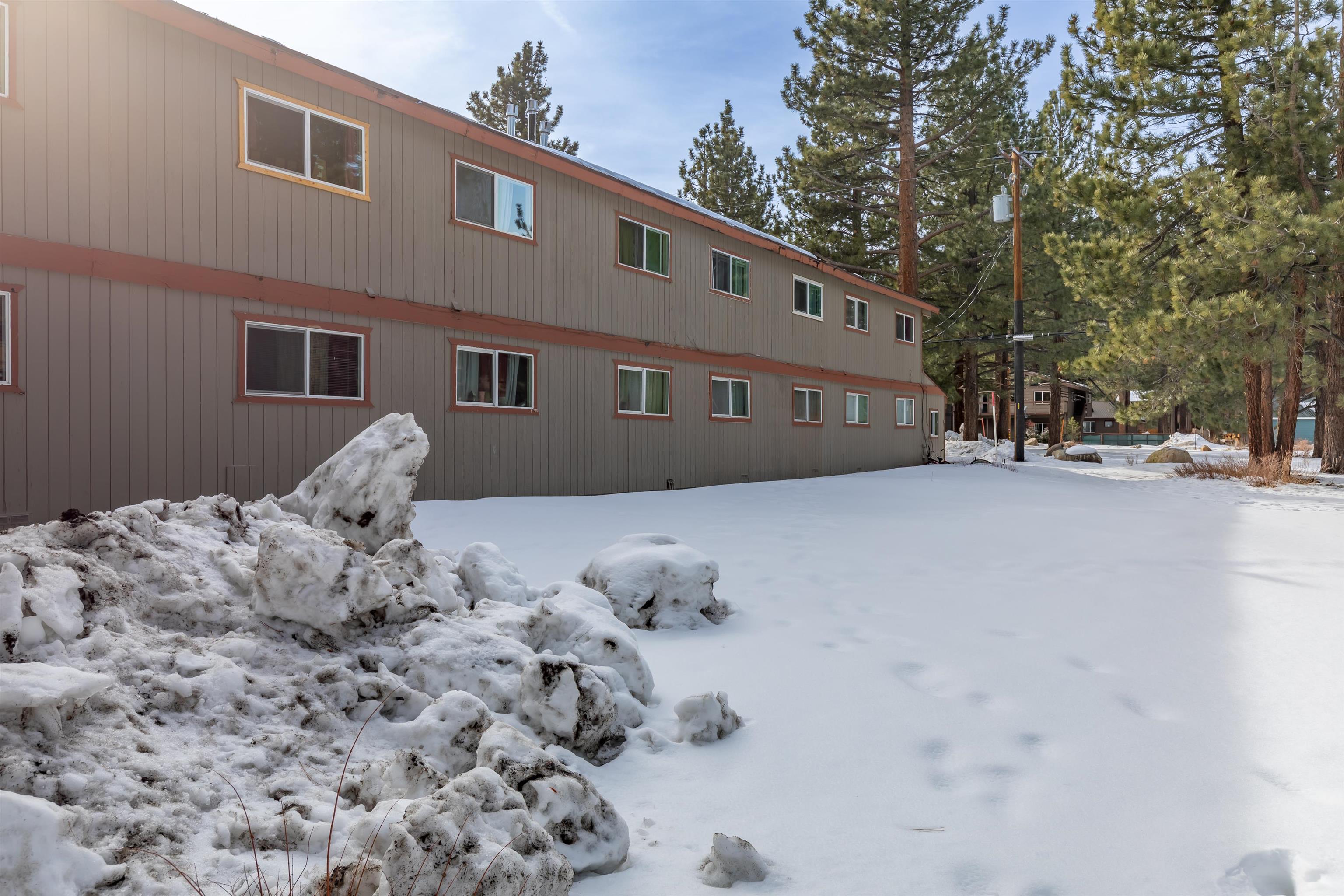 380 Chaparral Road Mammoth Lakes, CA 93546 - Photo 6 of 11 a front view of a house with a yard
