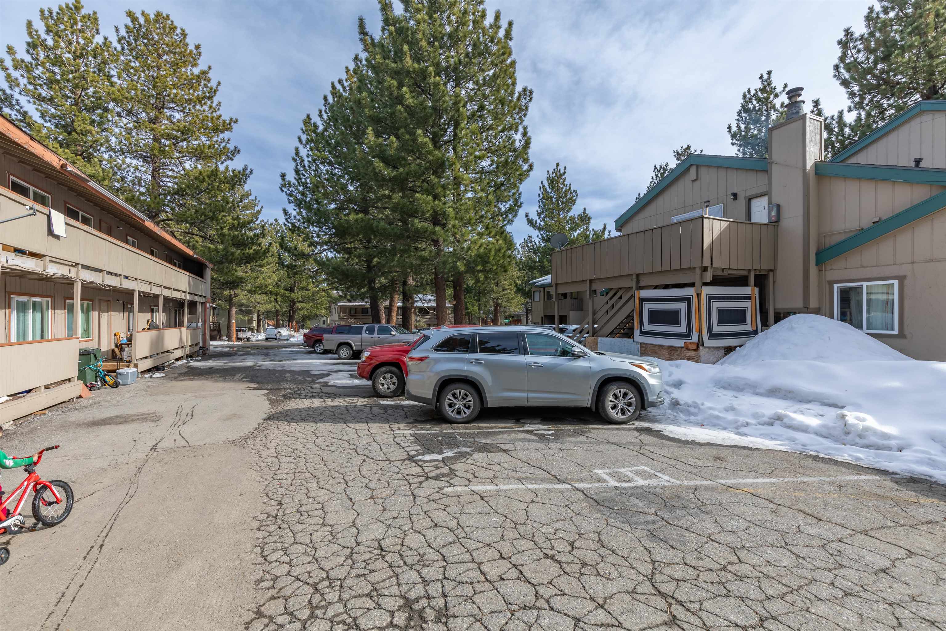 380 Chaparral Road Mammoth Lakes, CA 93546 - Photo 8 of 11 a view of street with parked cars