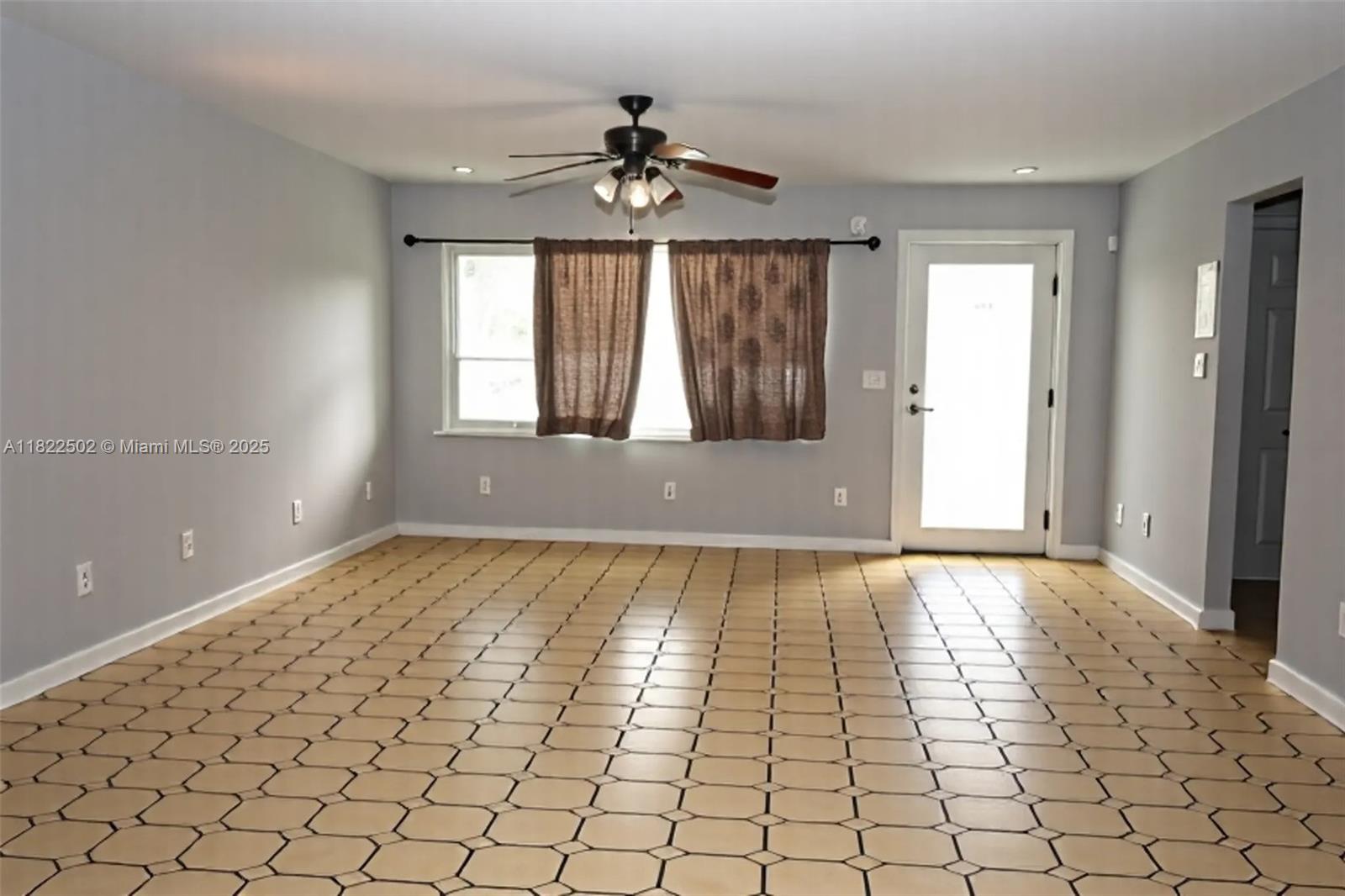 22115 Southwest 58th Avenue Boca Raton, FL 33428 - Photo 11 of 18 a view of an empty room and window