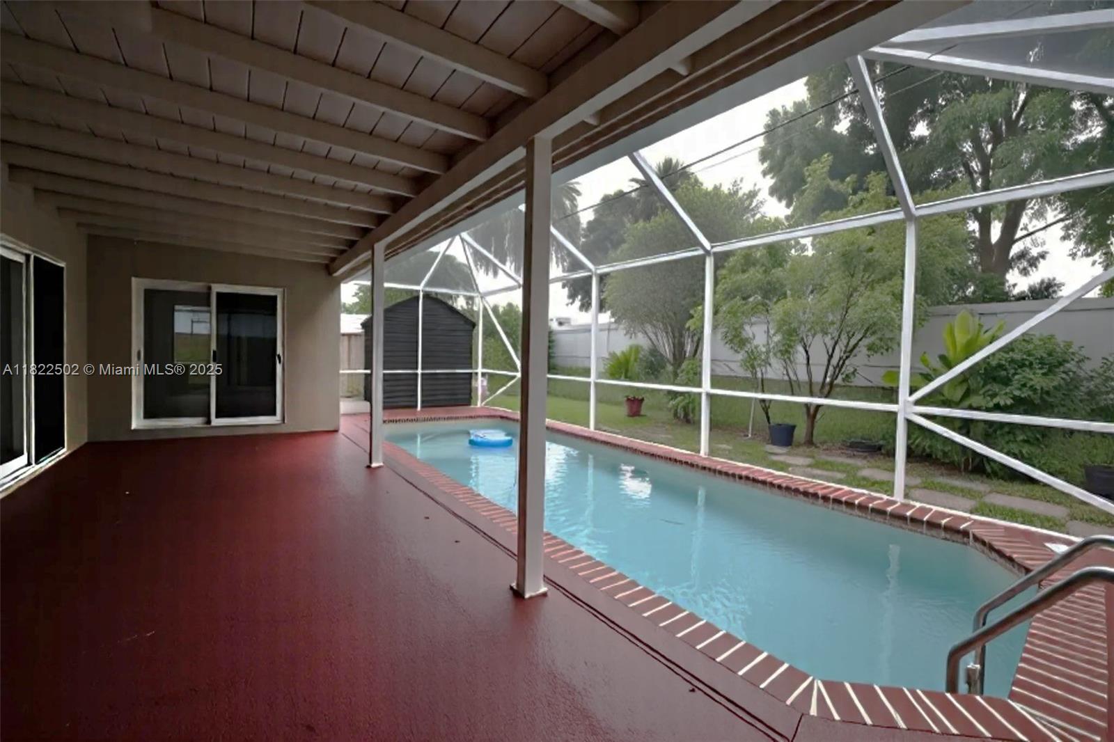 22115 Southwest 58th Avenue Boca Raton, FL 33428 - Photo 2 of 18 a view of a balcony with large windows