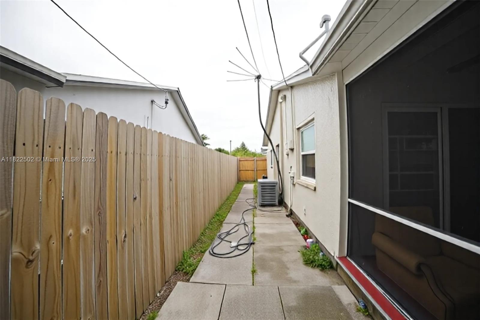 22115 Southwest 58th Avenue Boca Raton, FL 33428 - Photo 9 of 18 a view of a pathway of a building