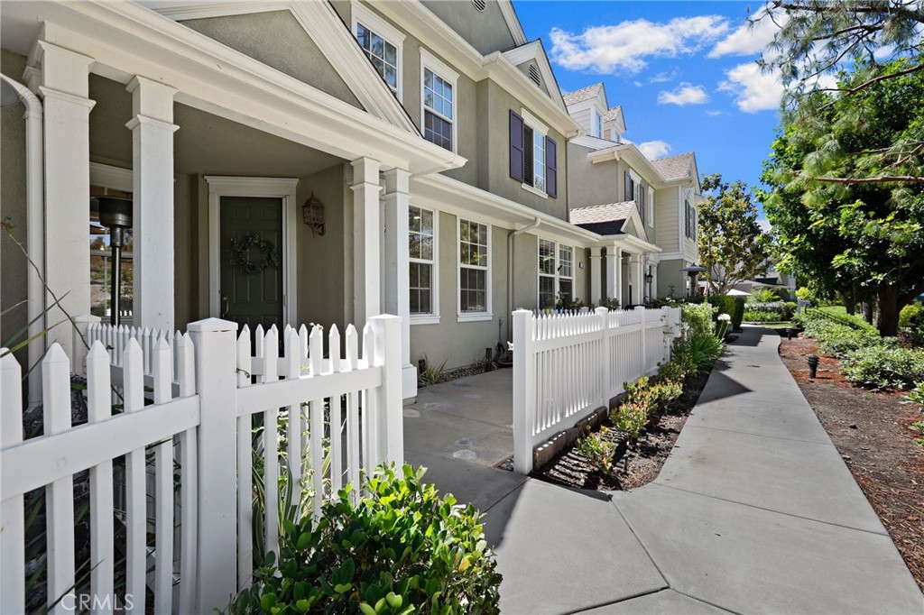 77 Strawflower Street Ladera Ranch, CA 92694 - Photo 1 of 1 a view of a house with wooden fence