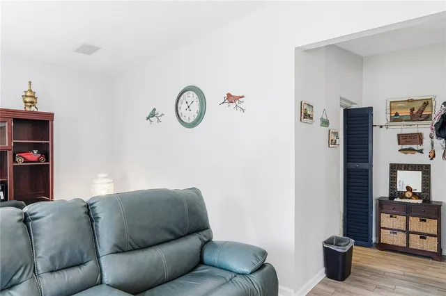 a kitchen with granite countertop a sink stove and cabinets