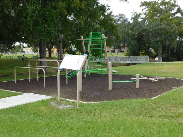 a view of a lake with a large trees