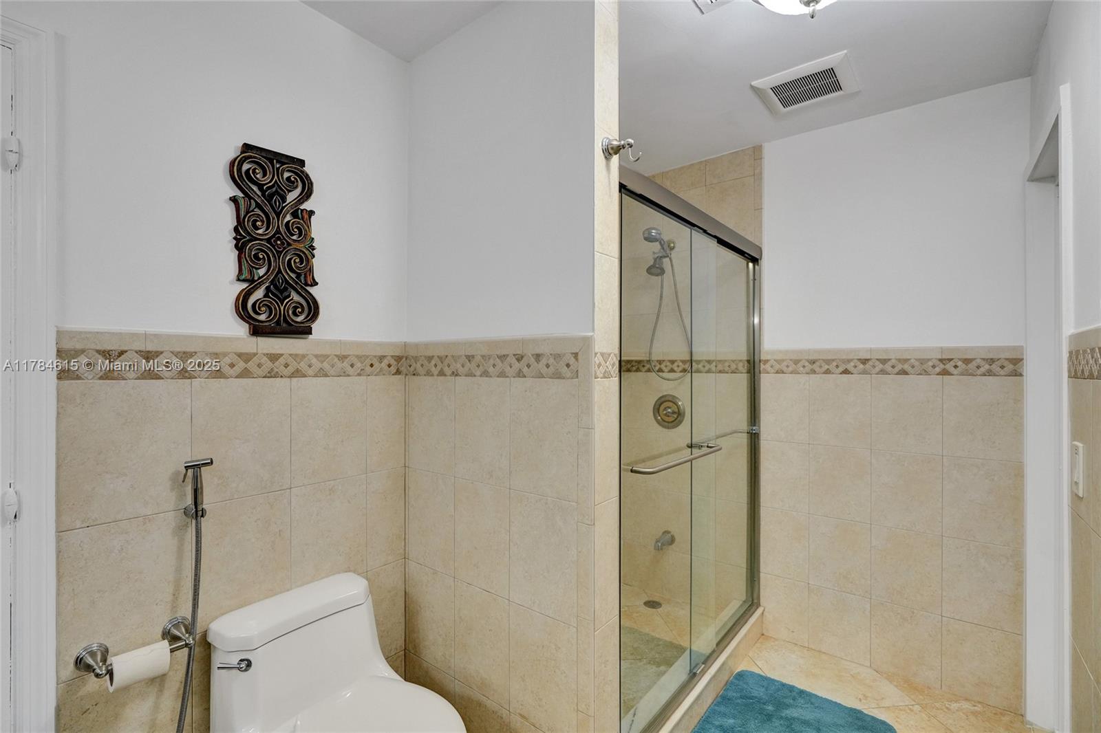 7360 Southwest 120th Street Pinecrest, FL 33156 - Photo 41 of 68 a bathroom with a shower