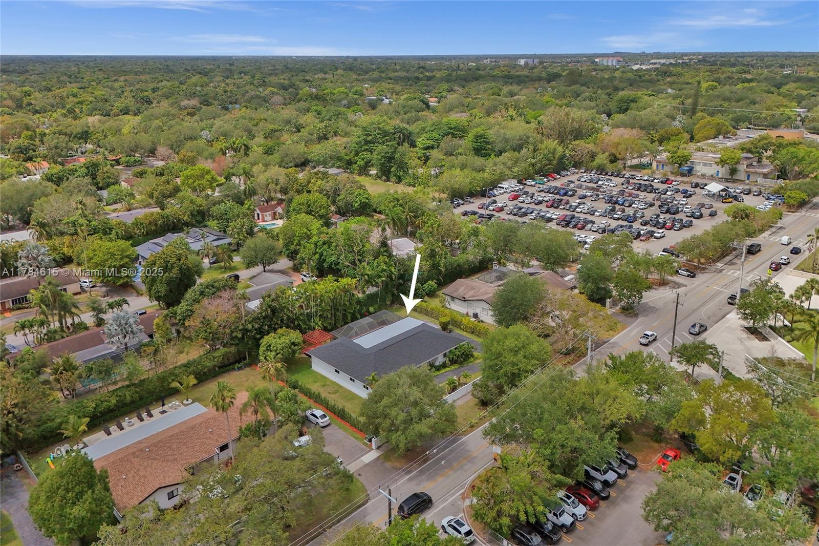 7360 Southwest 120th Street Pinecrest, FL 33156 - Photo 54 of 68 an aerial view of a city with lots of residential buildings