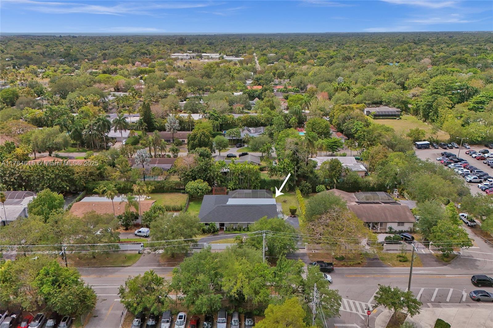 7360 Southwest 120th Street Pinecrest, FL 33156 - Photo 55 of 68 an aerial view of residential houses with outdoor space