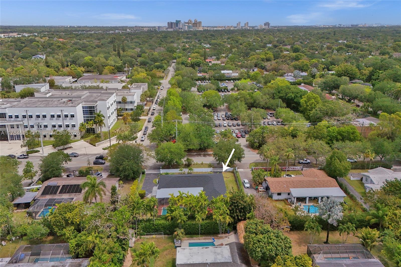 7360 Southwest 120th Street Pinecrest, FL 33156 - Photo 59 of 68 an aerial view of residential houses with outdoor space