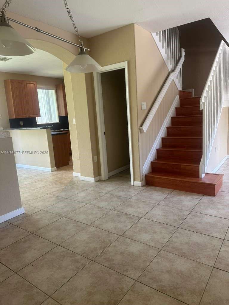 2913 Southeast 15th Road, Unit 64 Homestead, FL 33035 - Photo 6 of 14 a view of entryway and hall