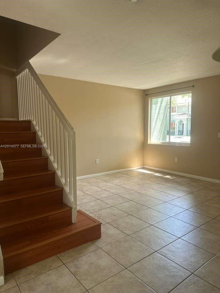 2913 Southeast 15th Road, Unit 64 Homestead, FL 33035 - Photo 7 of 14 a view of an entryway with wooden floor