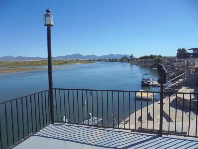 a view of a chairs and tables in patio