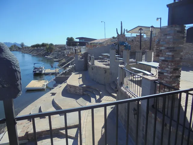 a living room with a table and chairs