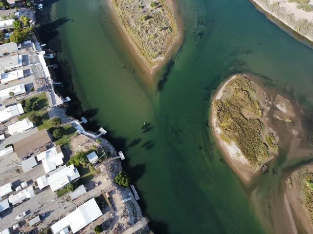 a terrace of a house with outdoor seating