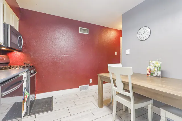 a view of a dining room with furniture