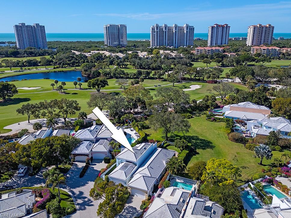 808 Rue Deville, Unit 35 Naples, FL 34108 - Photo 17 of 20 View of urban area featuring a nearby body of water and a local golf course