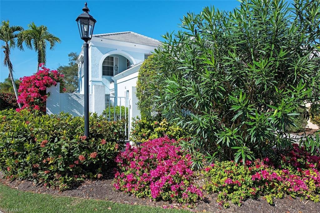 View of side of property featuring stucco siding
