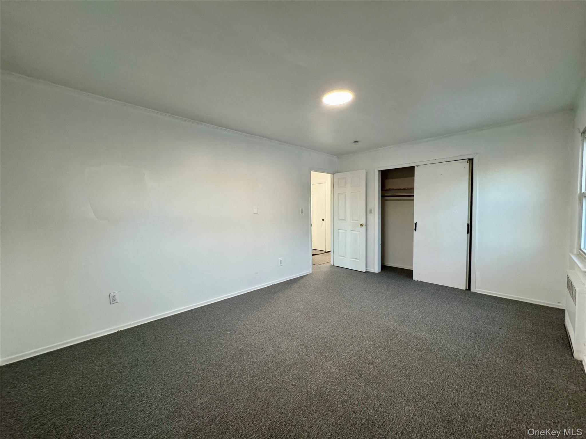 58 Cohill Road, Unit 2 Valley Stream, NY 11580 - Photo 16 of 23 an empty room with closet area