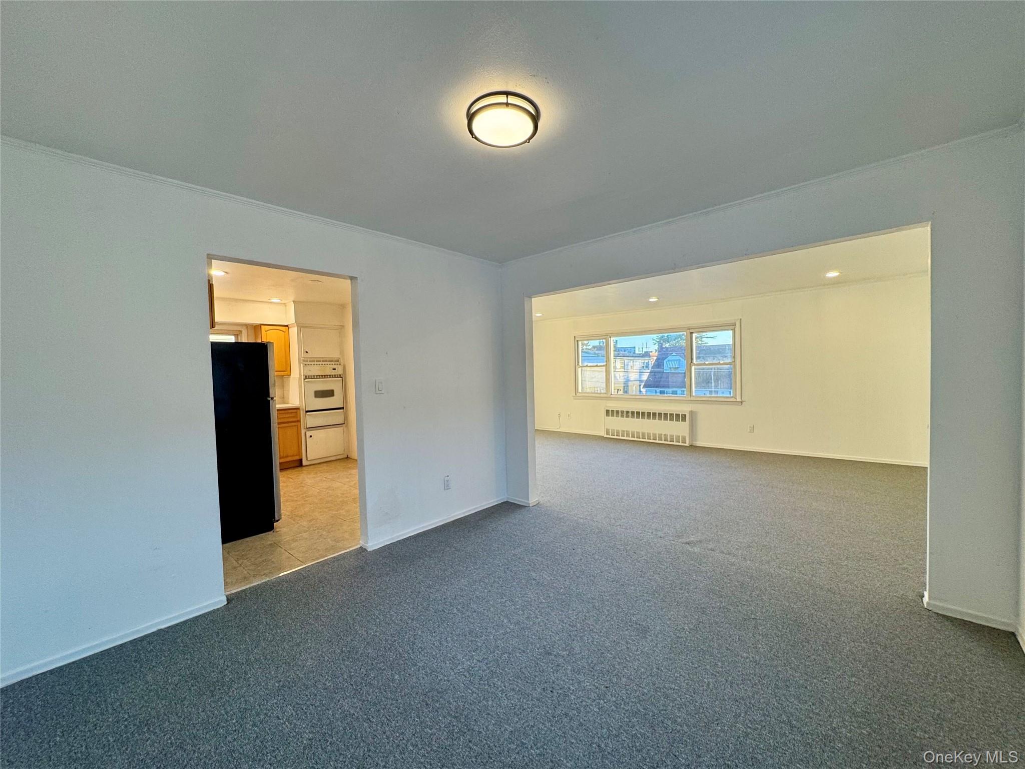 58 Cohill Road, Unit 2 Valley Stream, NY 11580 - Photo 8 of 23 a view of an empty room with a window