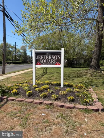 a view of a street with sign board