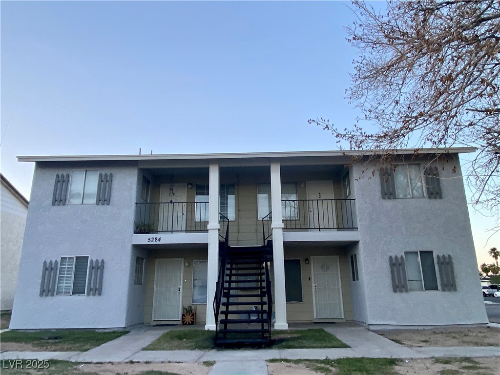 5284 Hagemann Lane, Unit D Las Vegas, NV 89110 - Photo 26 of 30 View of property featuring stairs