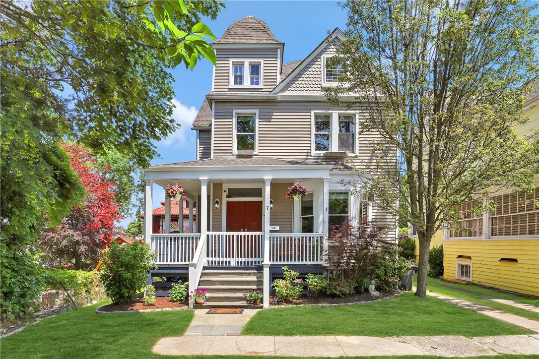 7 Edmarth Place Hastings-on-Hudson, NY 10706 - Photo 1 of 1 front view of a house with a yard