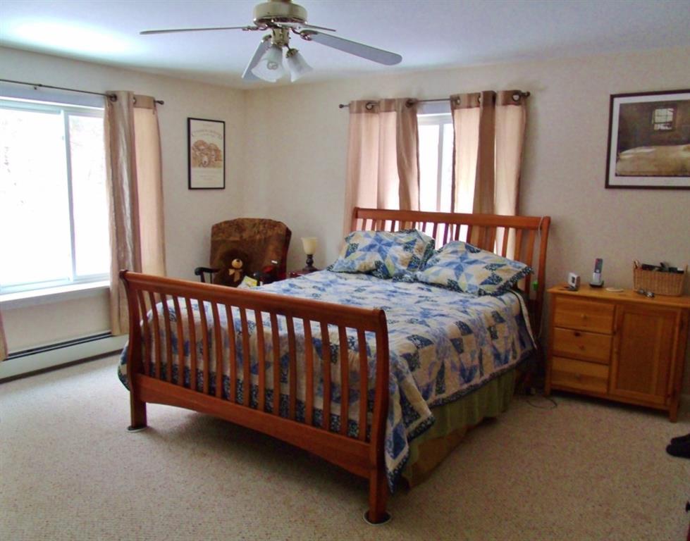 274 Red Schoolhouse Road Farmington, ME 04938 - Photo 8 of 26 Spacious master bedroom.
